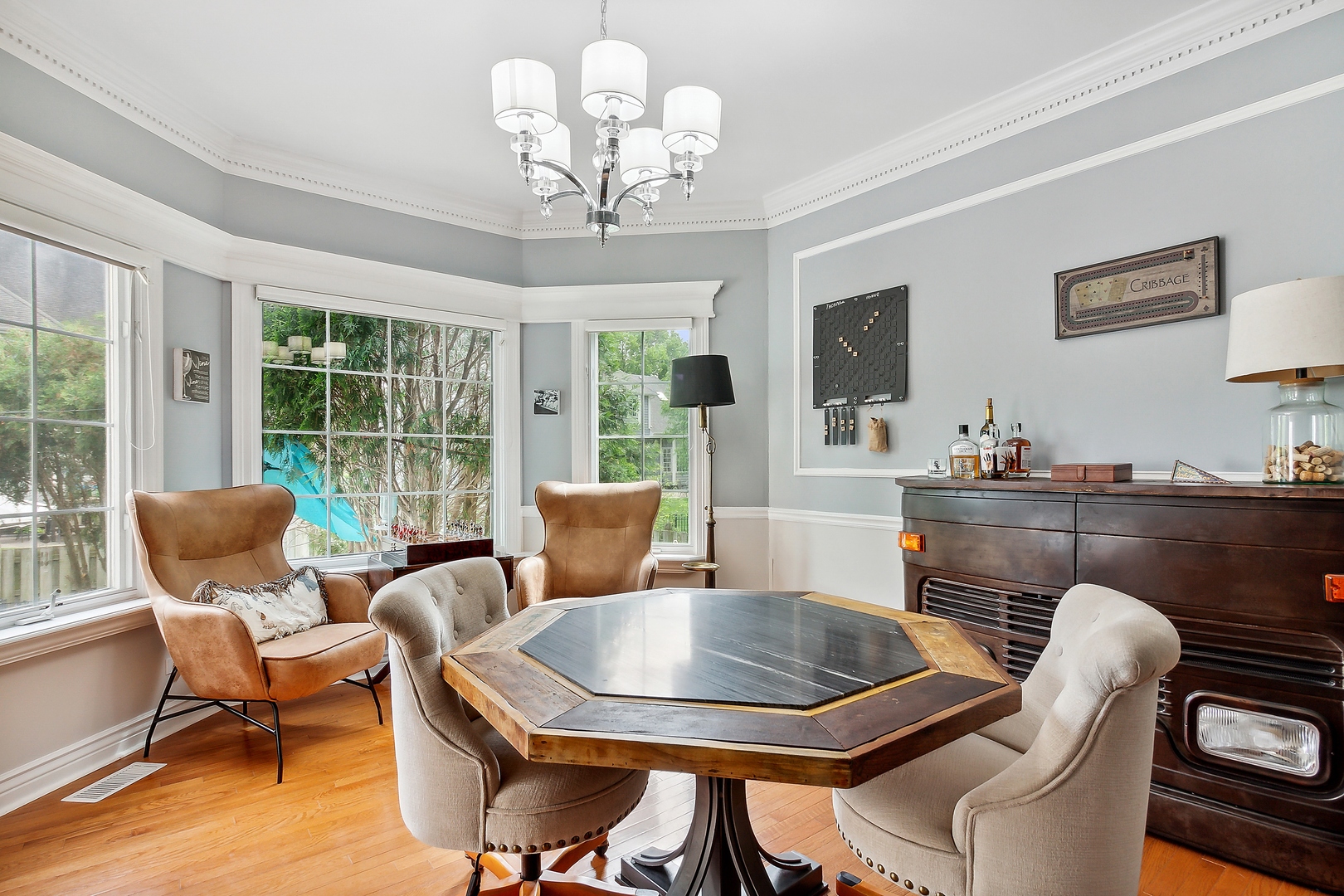 2252 Joyce Lane Naperville, IL 60564 - Photo 8 of 33 a view of a dining room with furniture wooden floor and chandelier