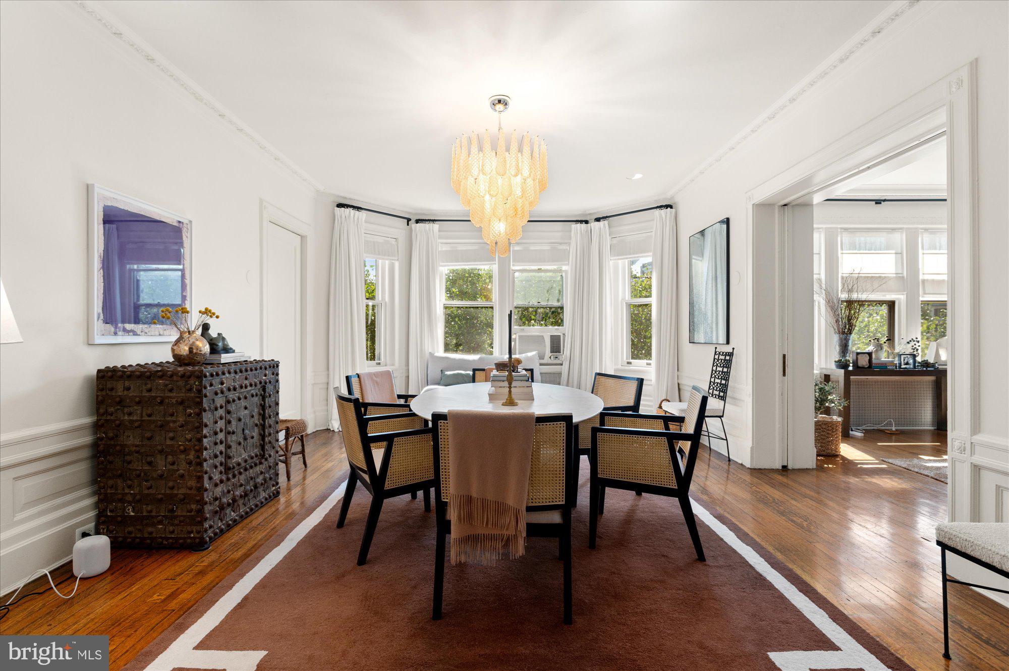 2029 Connecticut Avenue Northwest, Unit 42 Washington, DC 20008 - Photo 11 of 37 a view of a dining room with furniture window and outside view