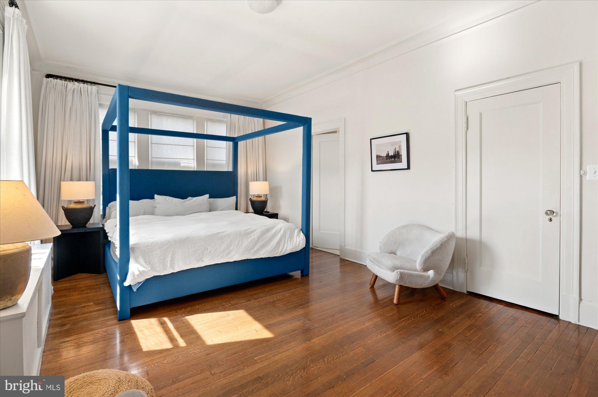 2029 Connecticut Avenue Northwest, Unit 42 Washington, DC 20008 - Photo 24 of 37 a bedroom with a bed and a window