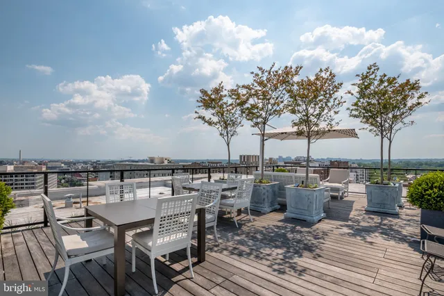 a view of a terrace with furniture