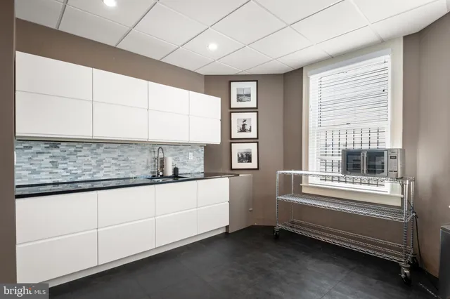 a bathroom with a sink and a bathtub