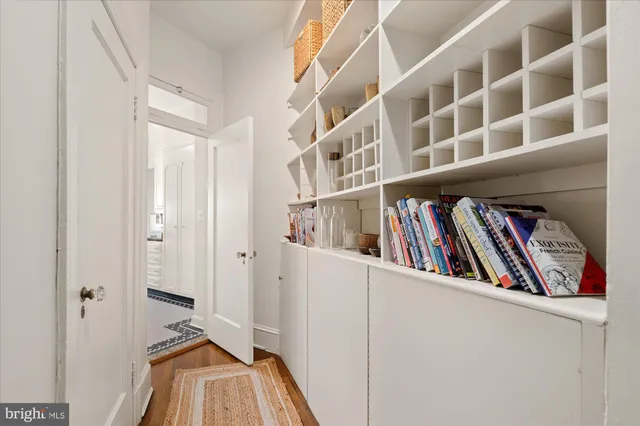 a view of a hallway with closet