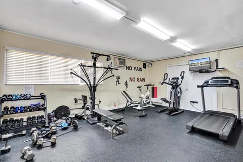 a view of a room with gym equipment