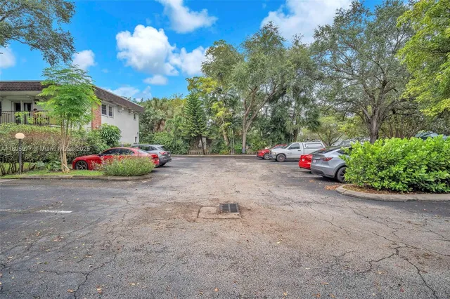 a car parked in front of a house