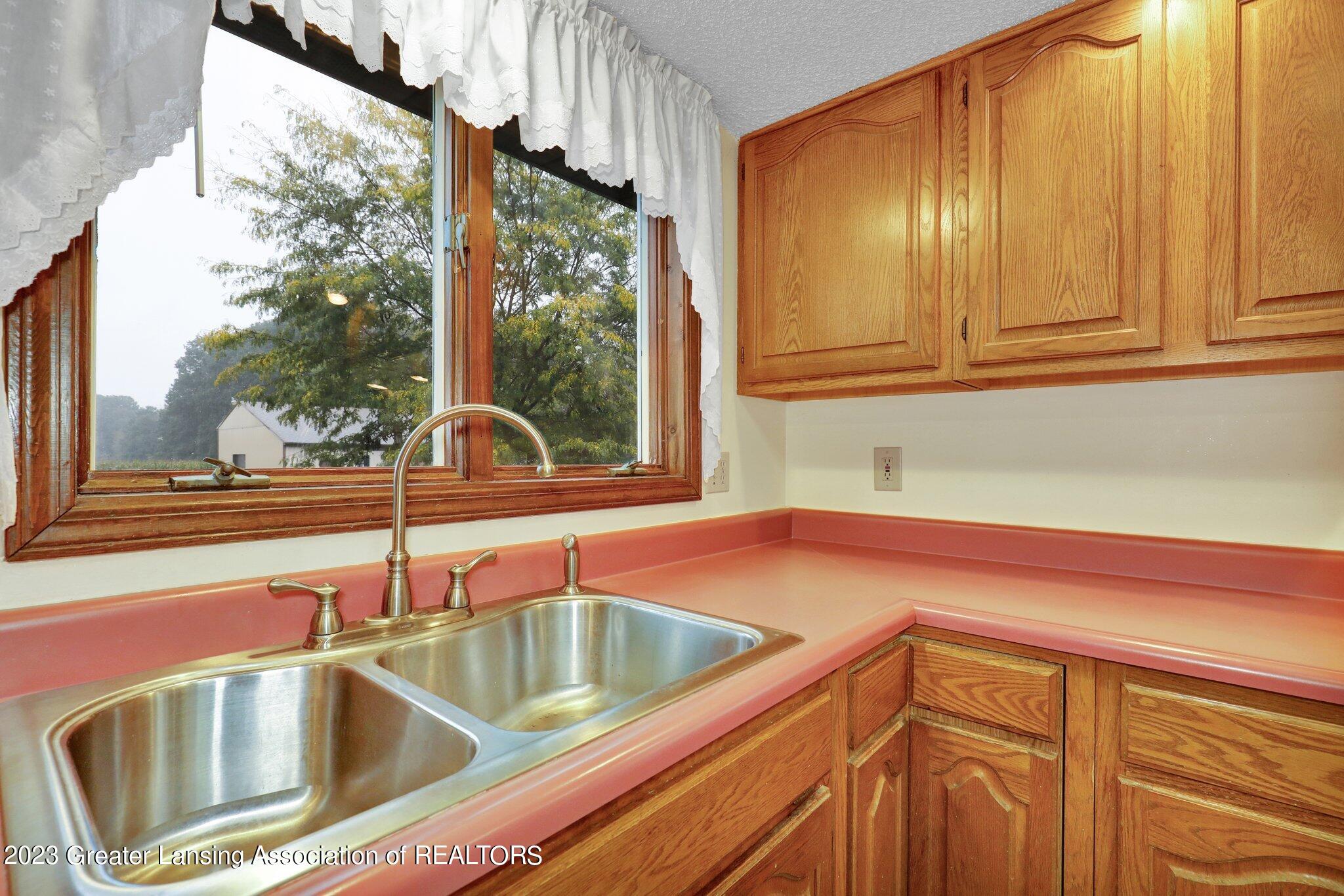 3777 Edgar Road Leslie, MI 49251 - Photo 19 of 39 3.5 Kitchen window view