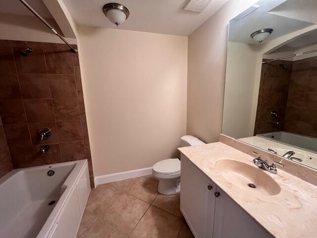 1690 Renaissance Commons Boulevard, Unit 1522 Boynton Beach, FL 33426 - Photo 11 of 31 a bathroom with a sink toilet and shower