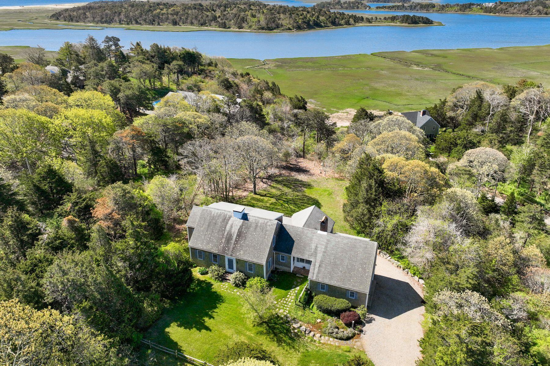 39 Sparrowhawk Road Orleans, MA 02653 - Photo 2 of 40 an aerial view of house with yard swimming pool and outdoor seating