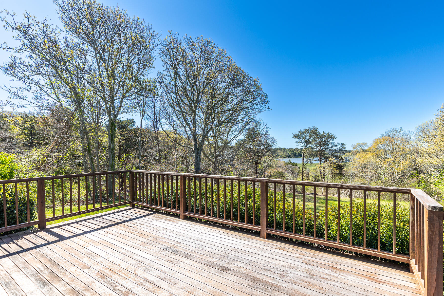39 Sparrowhawk Road Orleans, MA 02653 - Photo 31 of 40 a view of balcony with wooden floor and fence