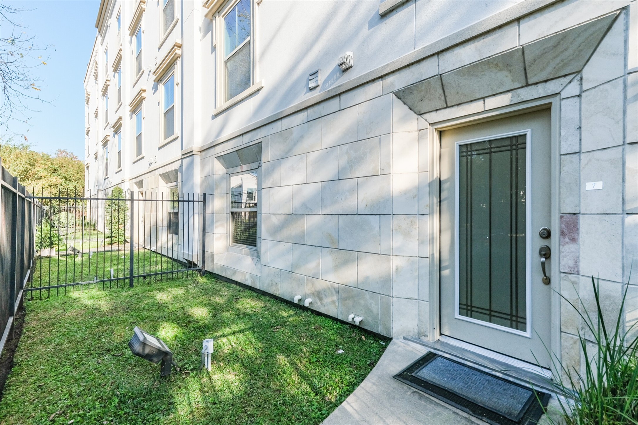 3501 Chenevert Street, Unit 7 Houston, TX 77004 - Photo 2 of 24 a view of back yard of the house