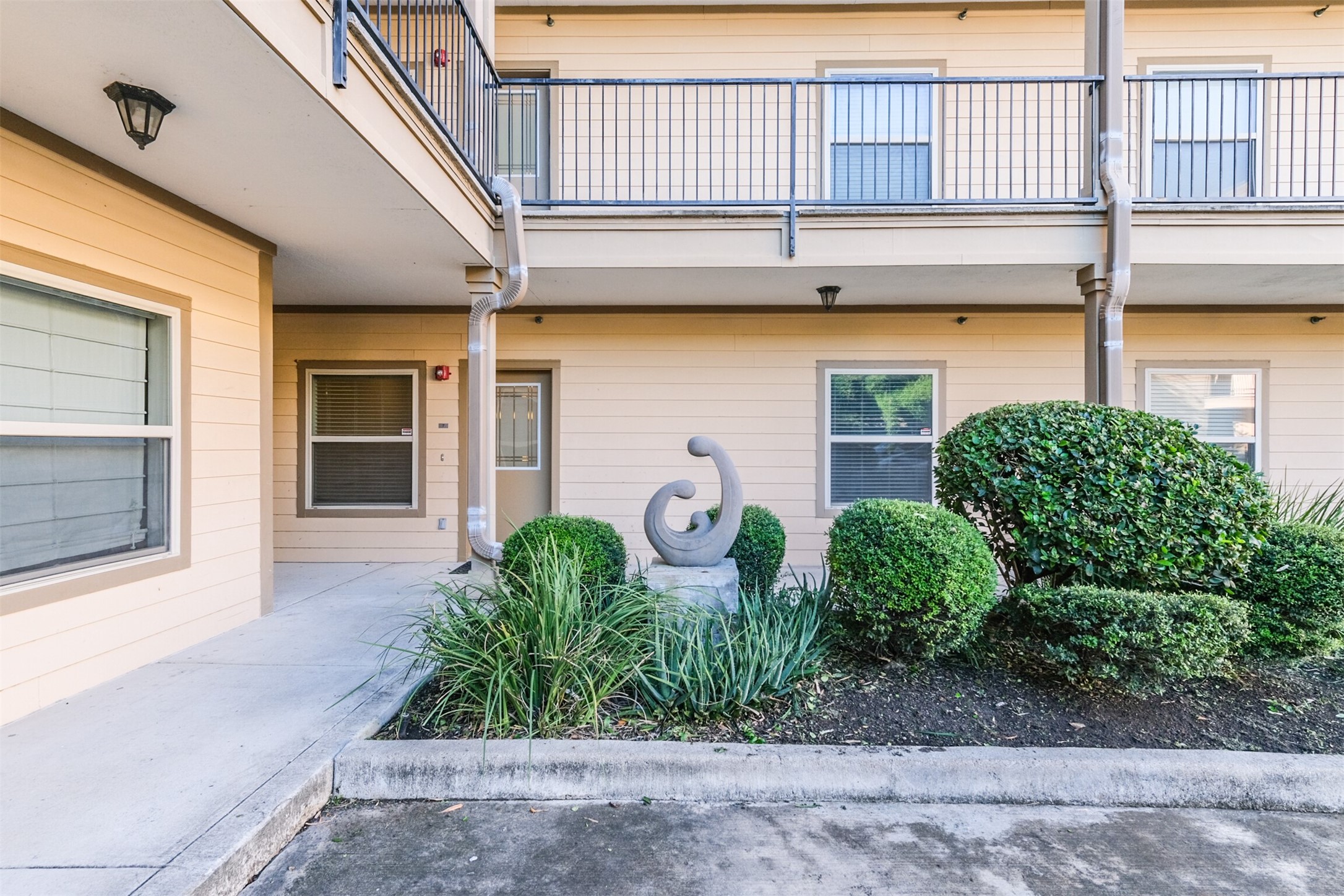 3501 Chenevert Street, Unit 7 Houston, TX 77004 - Photo 24 of 24 a front view of a house with garden