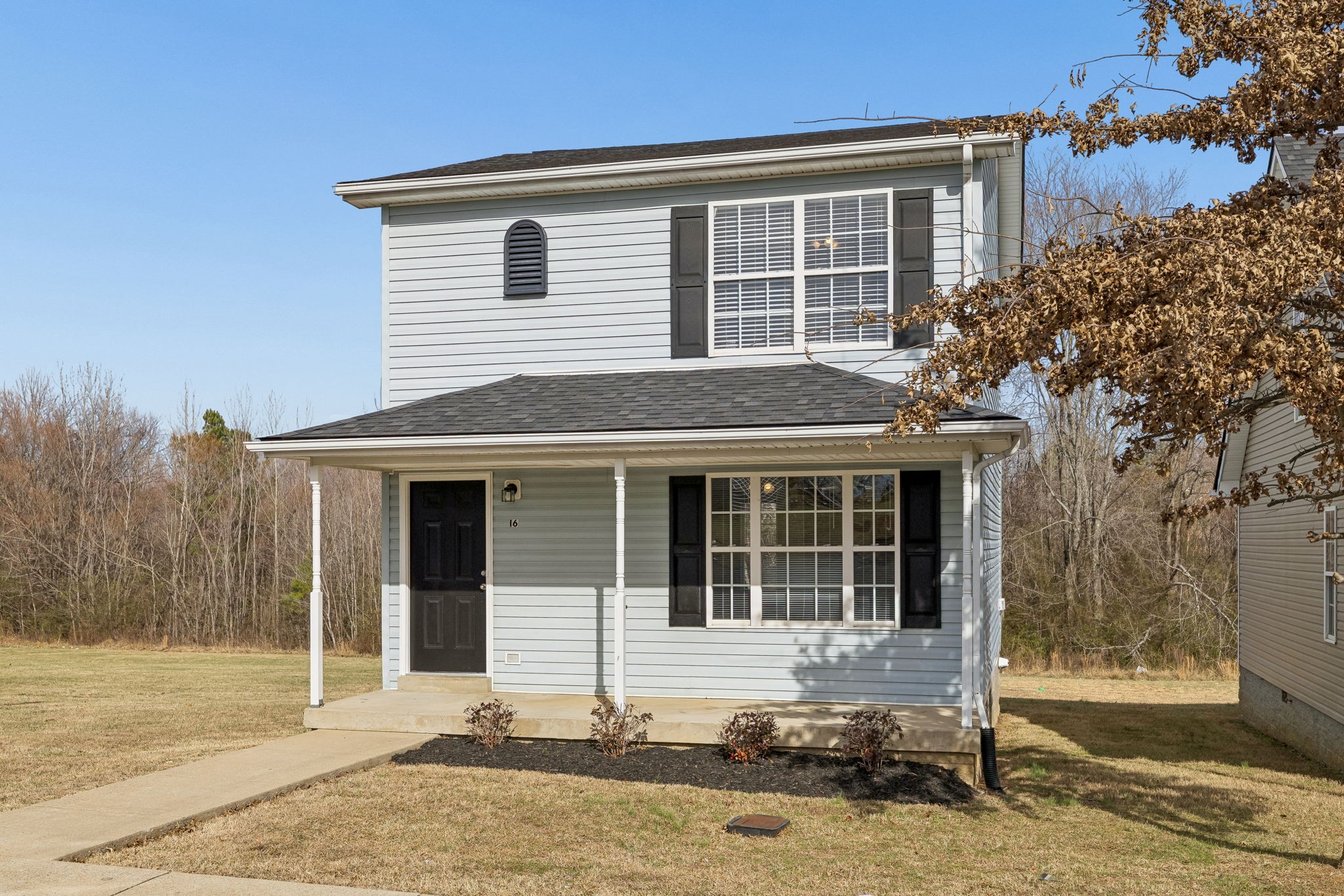 2607 Landrum Court, Unit 16 Springfield, TN 37172 - Photo 3 of 30 a front view of a house with a yard