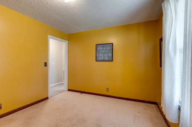 a view of a big room with wooden floor