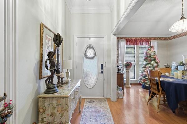4109 Hackmore Loop Irving, TX 75061 - Photo 4 of 13 a view of an entryway with wooden floor