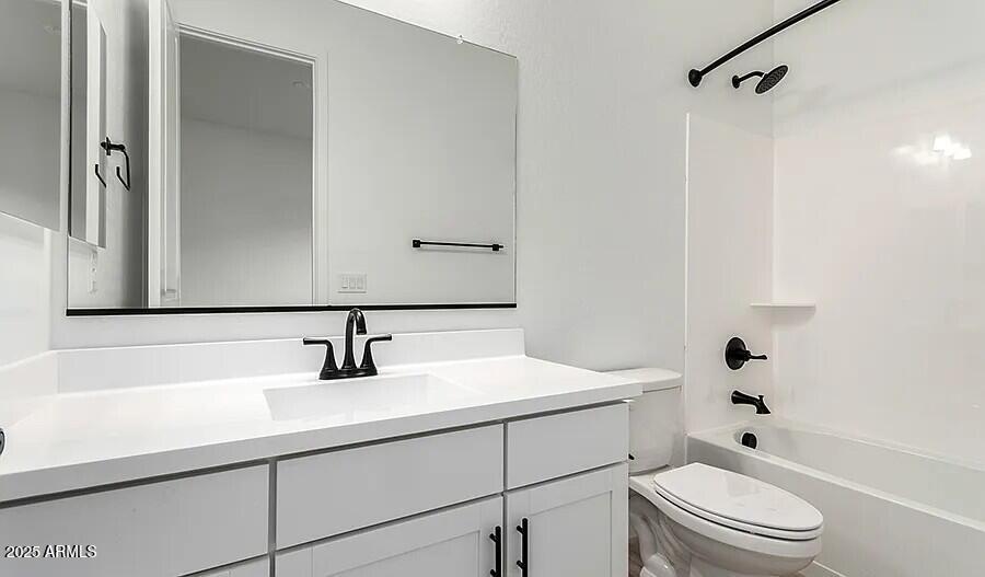 21837 East Bonanza Court Queen Creek, AZ 85142 - Photo 4 of 15 a bathroom with a sink a toilet and shower