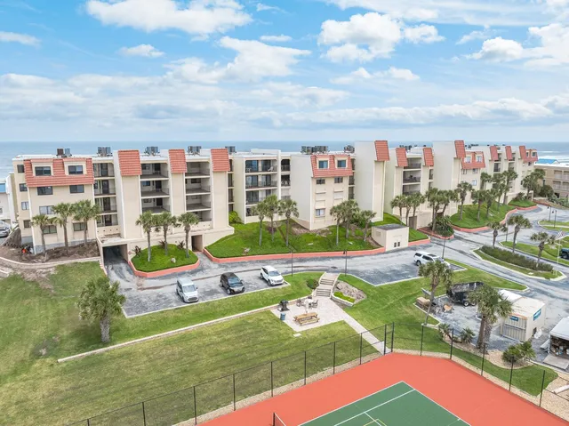 a view of swimming pool with outdoor seating yard