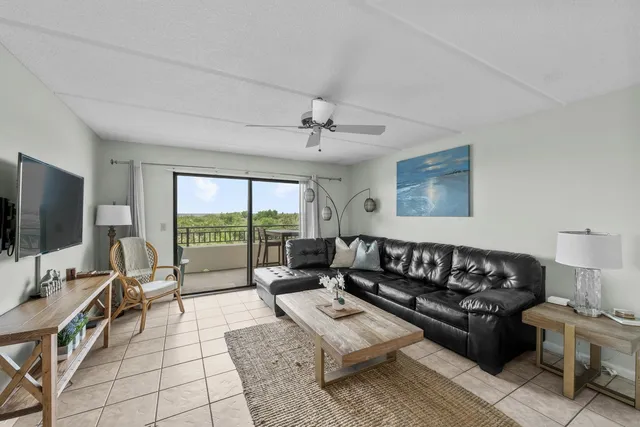 a view of swimming pool with outdoor seating