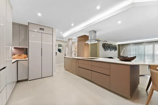 a large bathroom with a double vanity sink and mirror