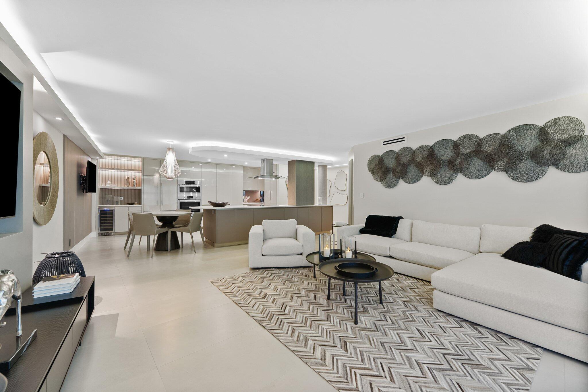 875 East Camino Real, Unit 2G Boca Raton, FL 33432 - Photo 12 of 55 a living room with furniture