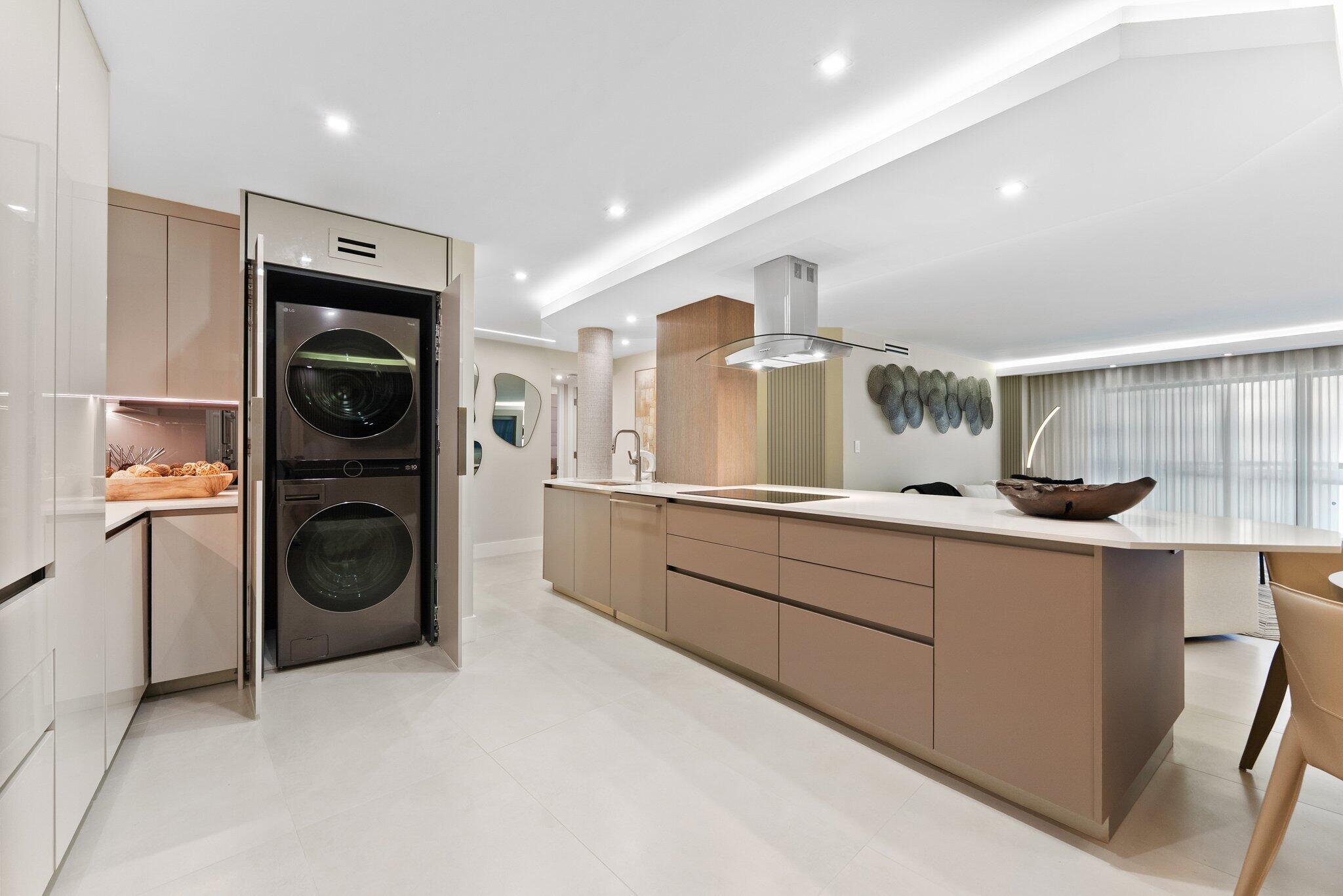 875 East Camino Real, Unit 2G Boca Raton, FL 33432 - Photo 4 of 55 a view of a hallway to closet and utility room