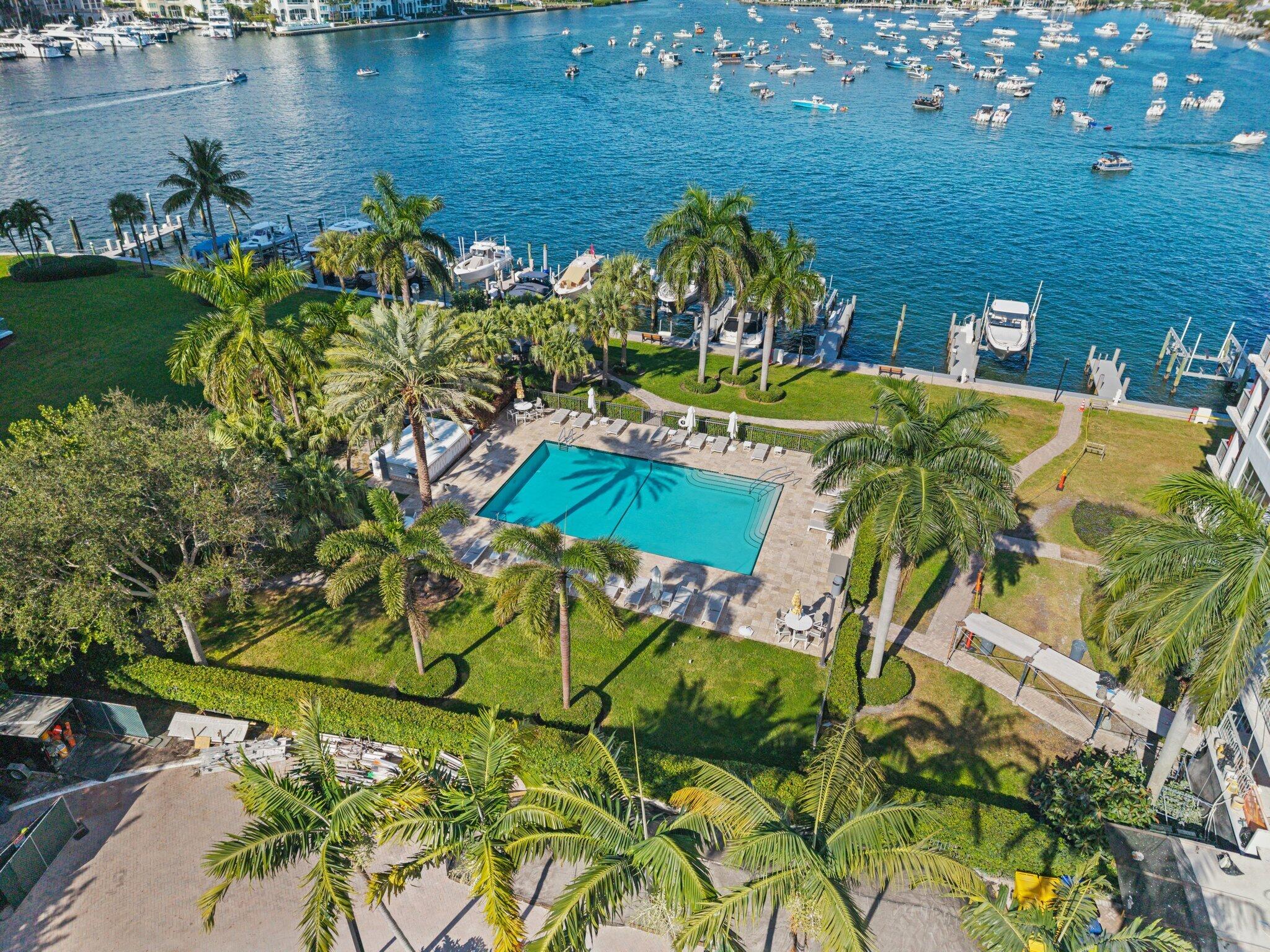 875 East Camino Real, Unit 2G Boca Raton, FL 33432 - Photo 41 of 55 a view of a lake with a garden