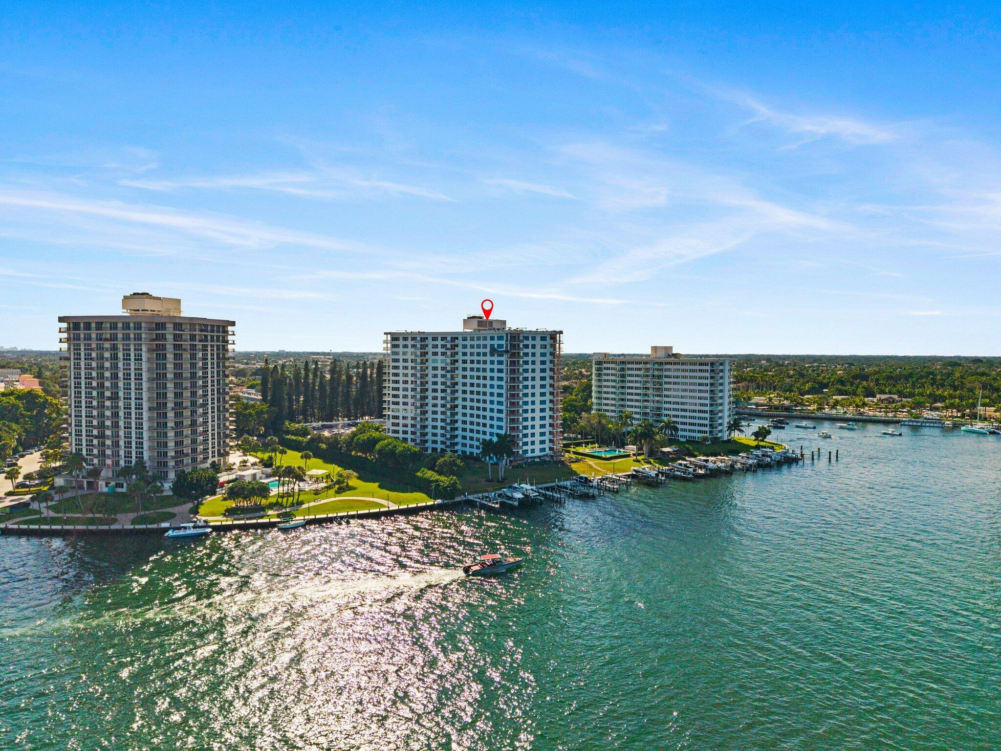 875 East Camino Real, Unit 2G Boca Raton, FL 33432 - Photo 44 of 55 a view of swimming pool with outdoor seating and city view
