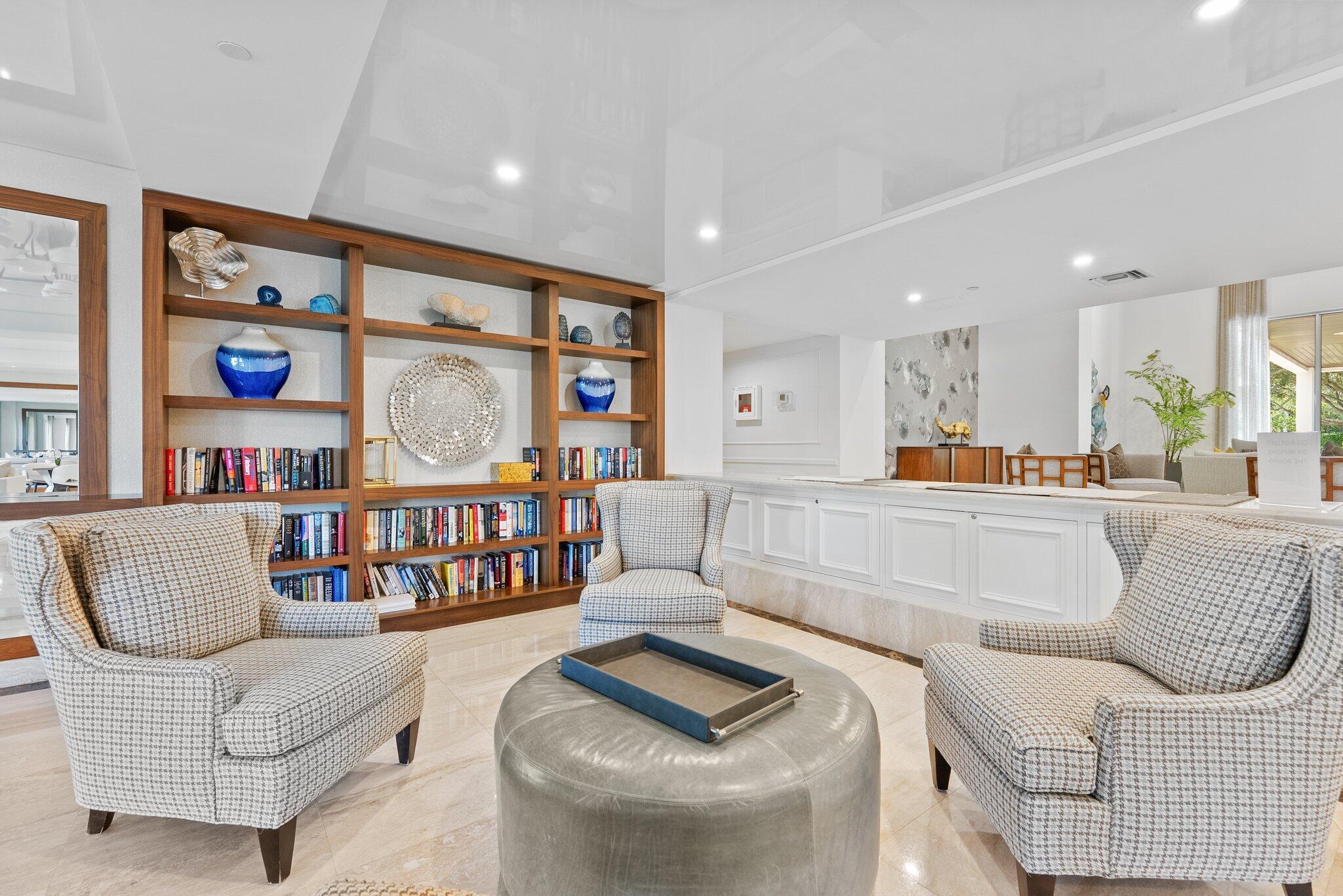 875 East Camino Real, Unit 2G Boca Raton, FL 33432 - Photo 45 of 55 a living room with furniture and a large window