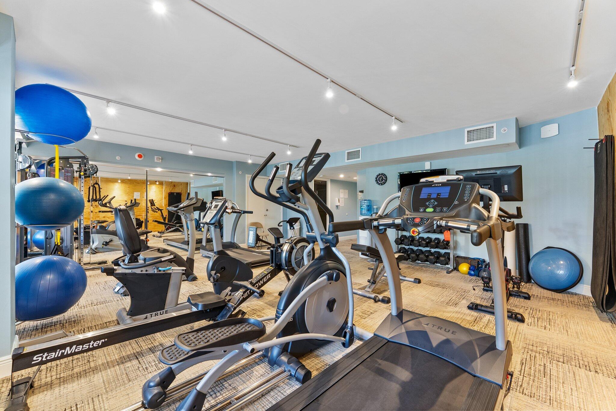 875 East Camino Real, Unit 2G Boca Raton, FL 33432 - Photo 53 of 55 a view of a room with gym equipment