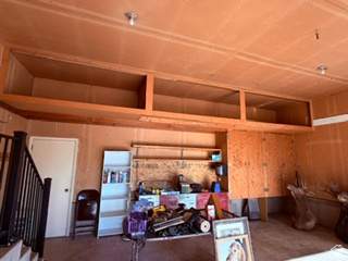 588 North 4500 West West Point, UT 84015 - Photo 39 of 61 Garage featuring overhead wood-finish storage cabinets and built-in wood-finish shelving