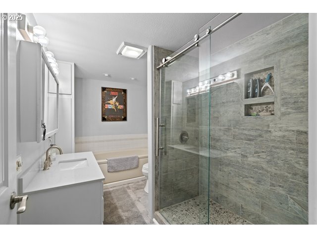 33968 East Loop Road Stanfield, OR 97875 - Photo 15 of 48 a bathroom with a sink mirror and a shower