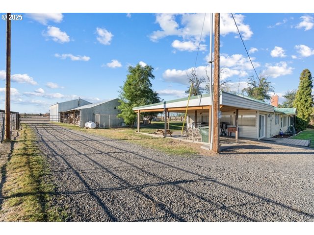 33968 East Loop Road Stanfield, OR 97875 - Photo 27 of 48 a view of house with a yard