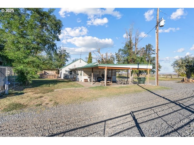 33968 East Loop Road Stanfield, OR 97875 - Photo 43 of 48 a view of a house with a yard