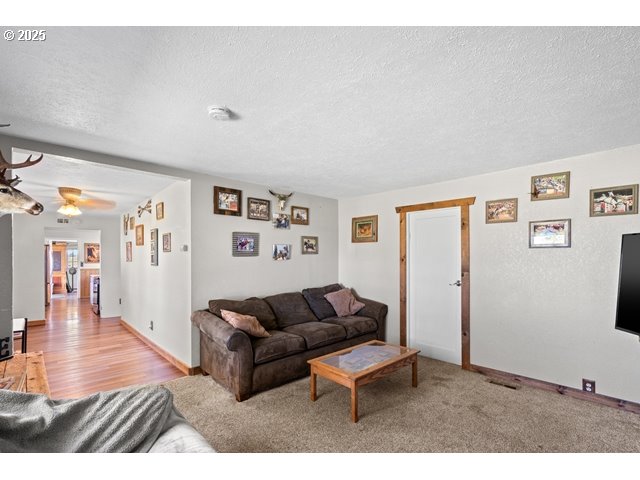 33968 East Loop Road Stanfield, OR 97875 - Photo 5 of 48 a living room with furniture and a wooden floor