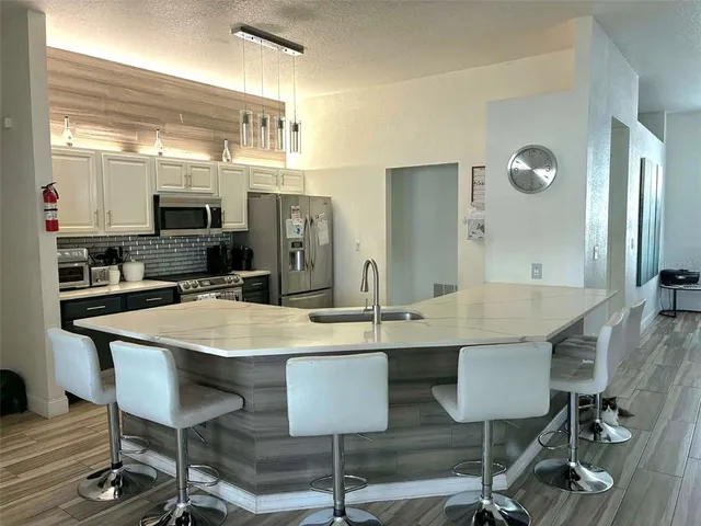 a bedroom with bed and window