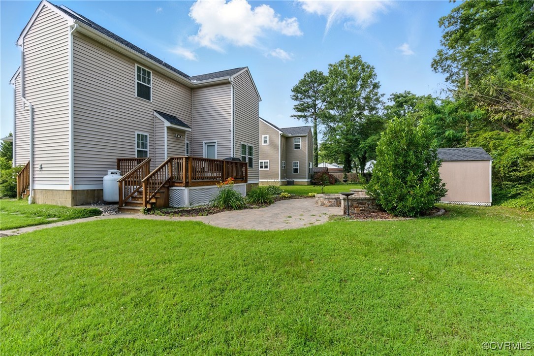2201 Vandover Road Henrico, VA 23229 - Photo 37 of 43 a front view of a house with a yard and trees
