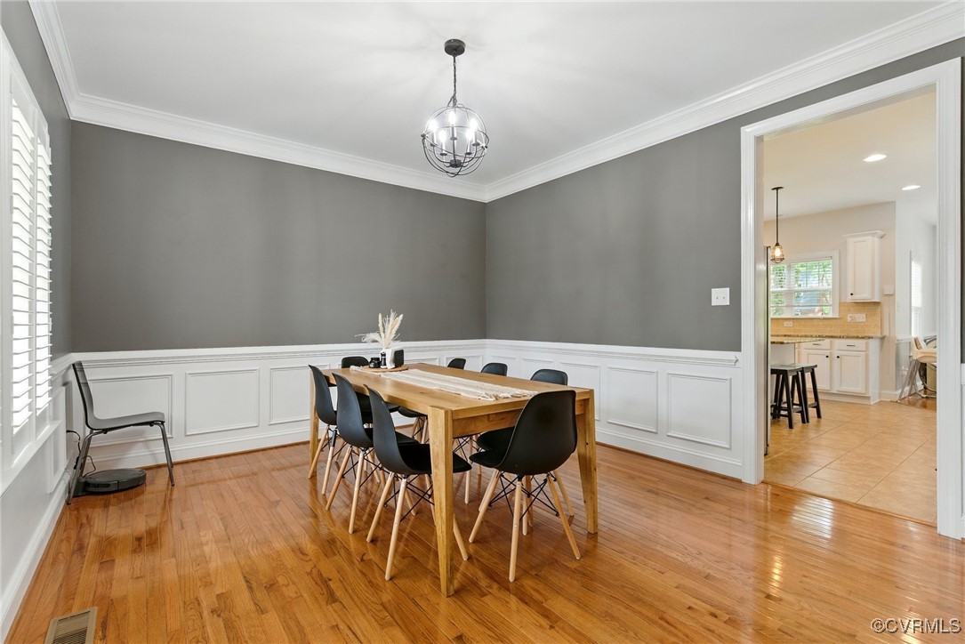 2201 Vandover Road Henrico, VA 23229 - Photo 7 of 43 a view of a dining room with furniture and wooden floor