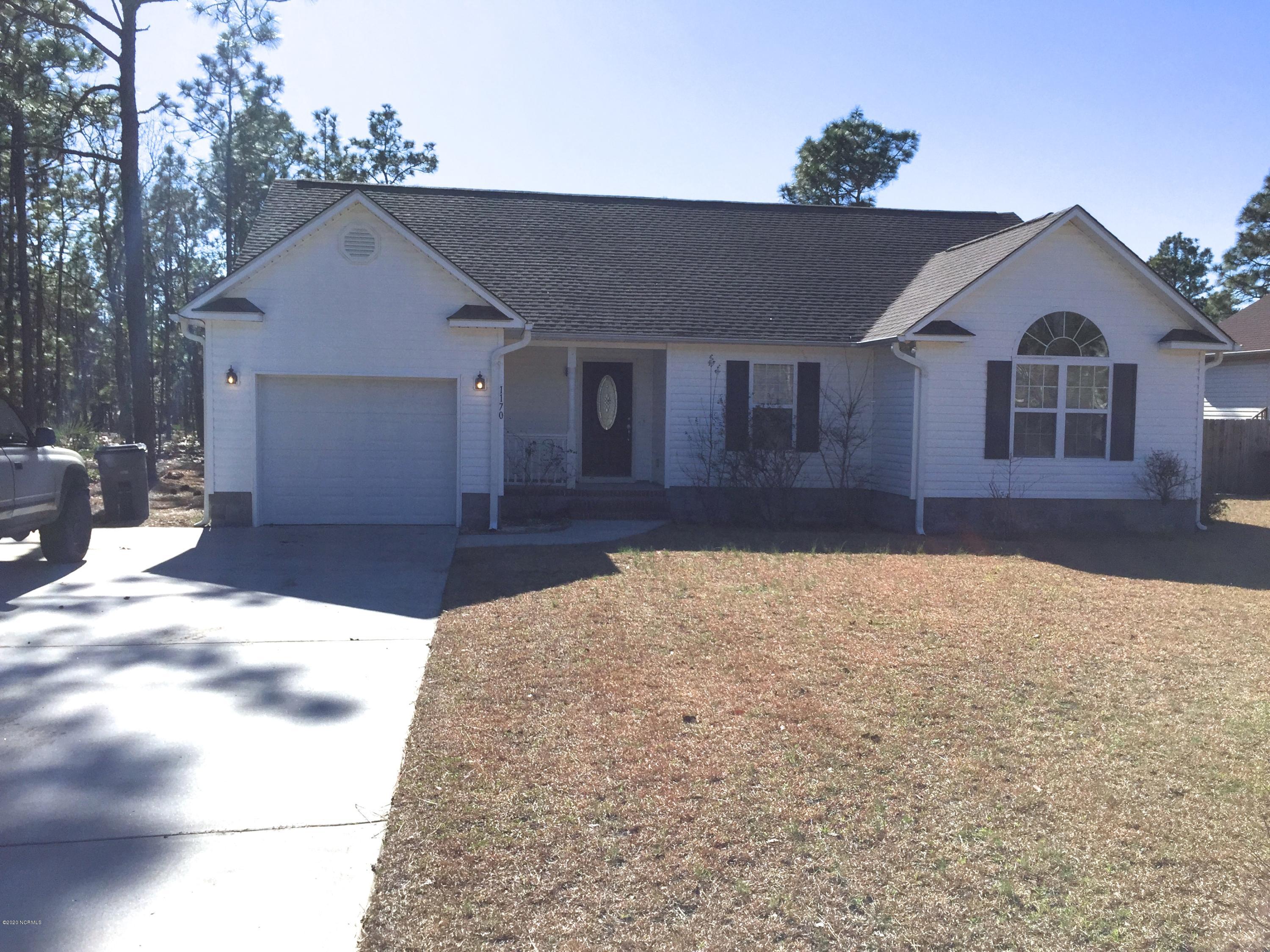 1170 Pierce Road Southport, NC 28461 - Photo 1 of 15 Front view