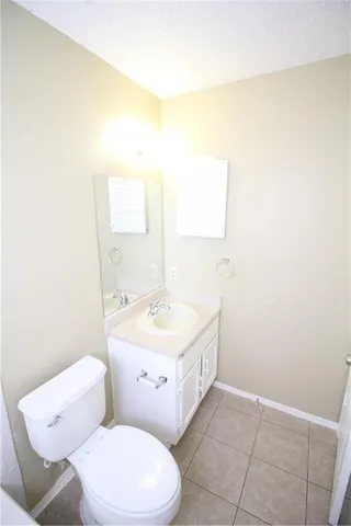 a bathroom with a toilet and a bathtub
