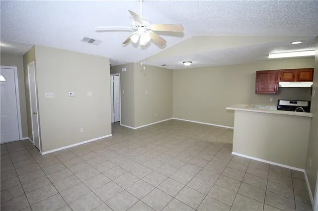 a view of a livingroom with furniture