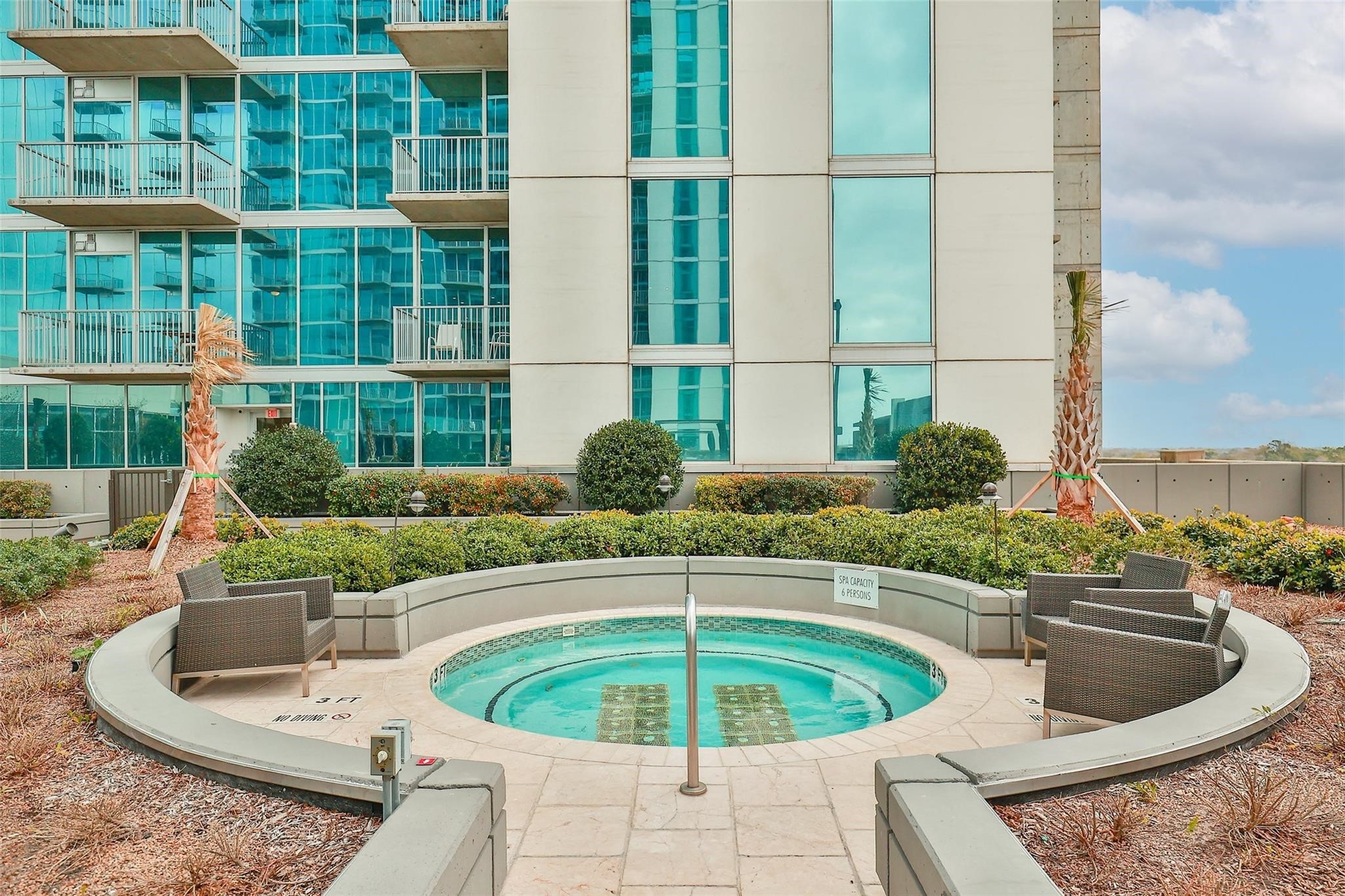 5925 Almeda Road, Unit 12308 Houston, TX 77004 - Photo 39 of 48 a view of a swimming pool with a patio