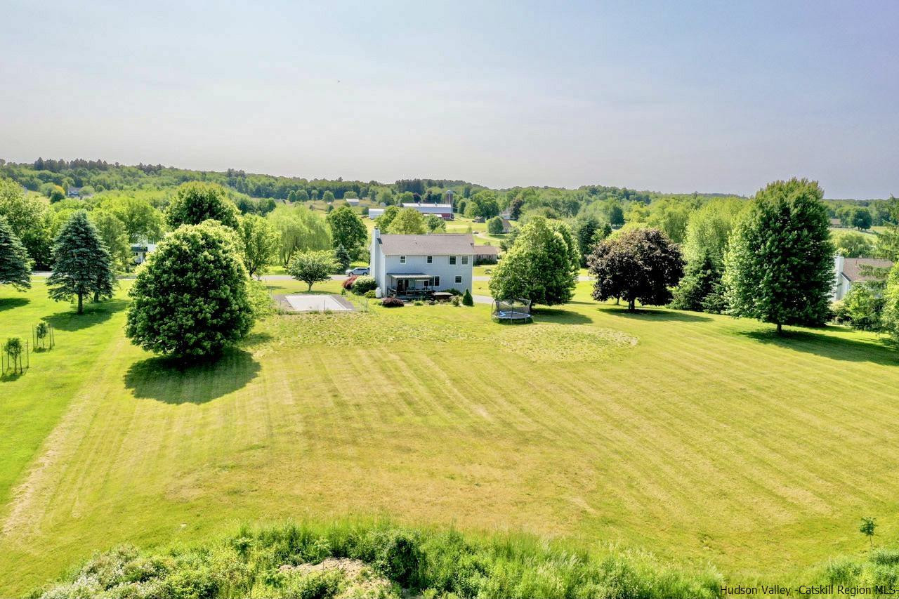 29 Millbrook Road Gardiner, NY 12589 - Photo 32 of 34 a swimming pool with an outdoor space and seating area