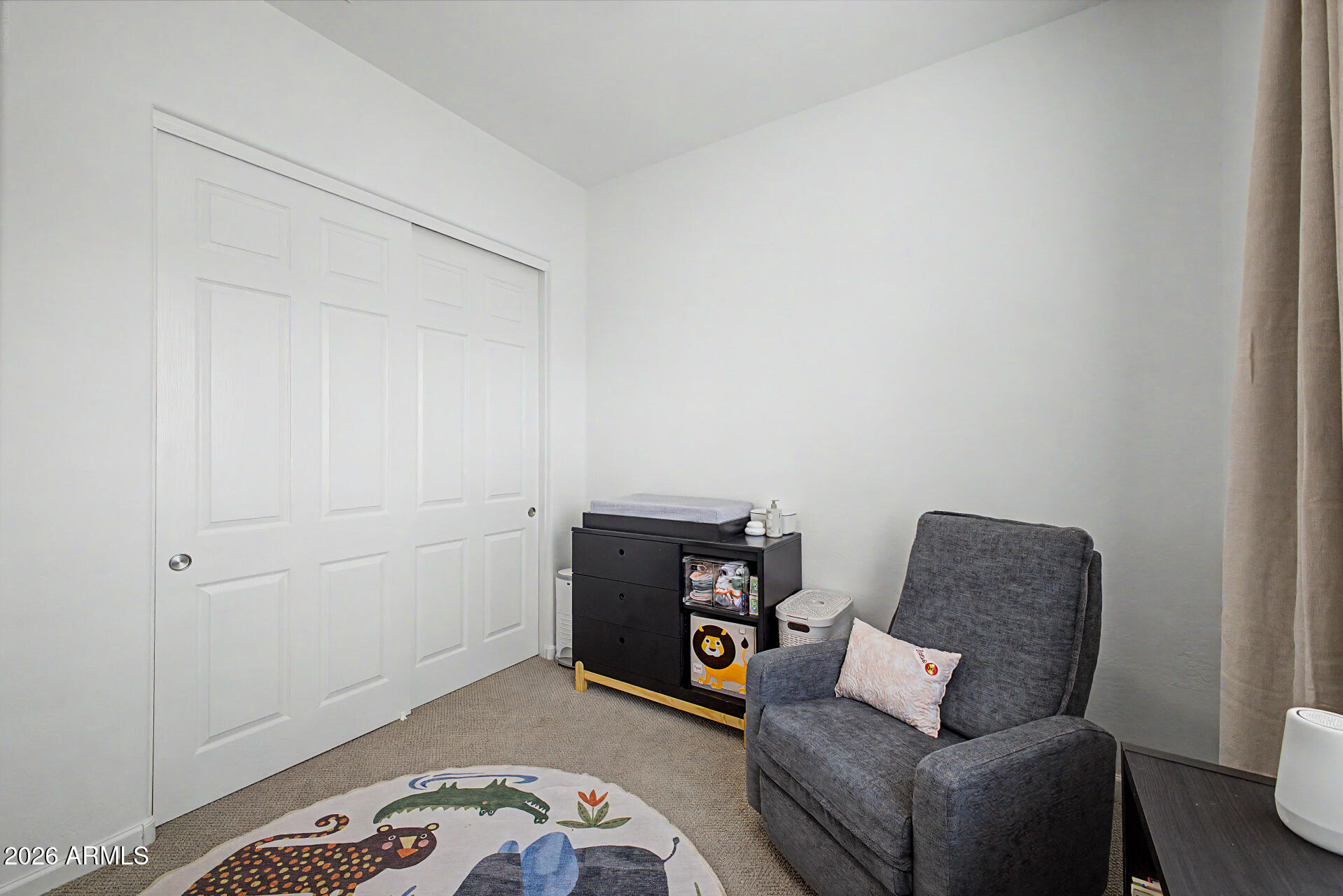 6511 West Steed Ridge Phoenix, AZ 85083 - Photo 24 of 41 a bedroom with a bed and a couch