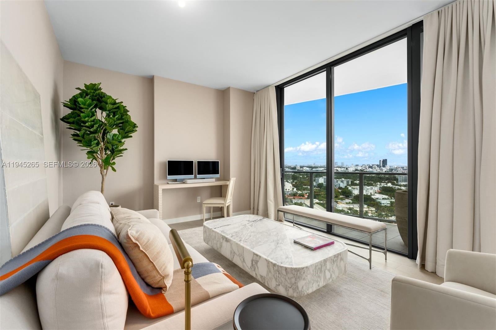 500 Alton Road, Unit 2105 Miami Beach, FL 33139 - Photo 15 of 44 a outdoor living space with furniture and a potted plant