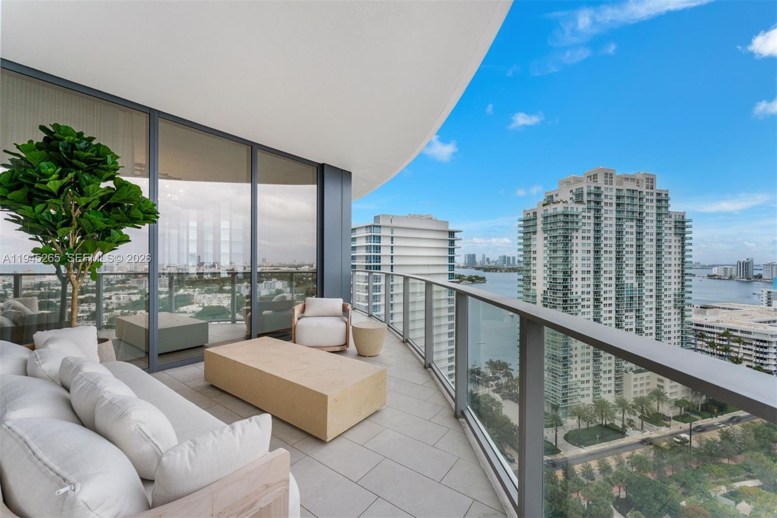 500 Alton Road, Unit 2105 Miami Beach, FL 33139 - Photo 29 of 44 a balcony with furniture and city view