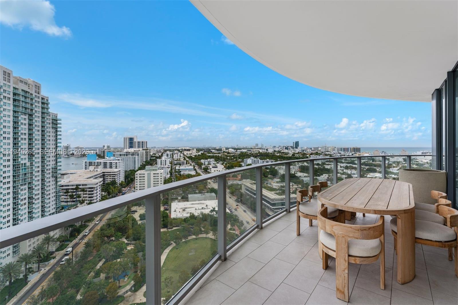 500 Alton Road, Unit 2105 Miami Beach, FL 33139 - Photo 9 of 44 a view of a balcony with chairs