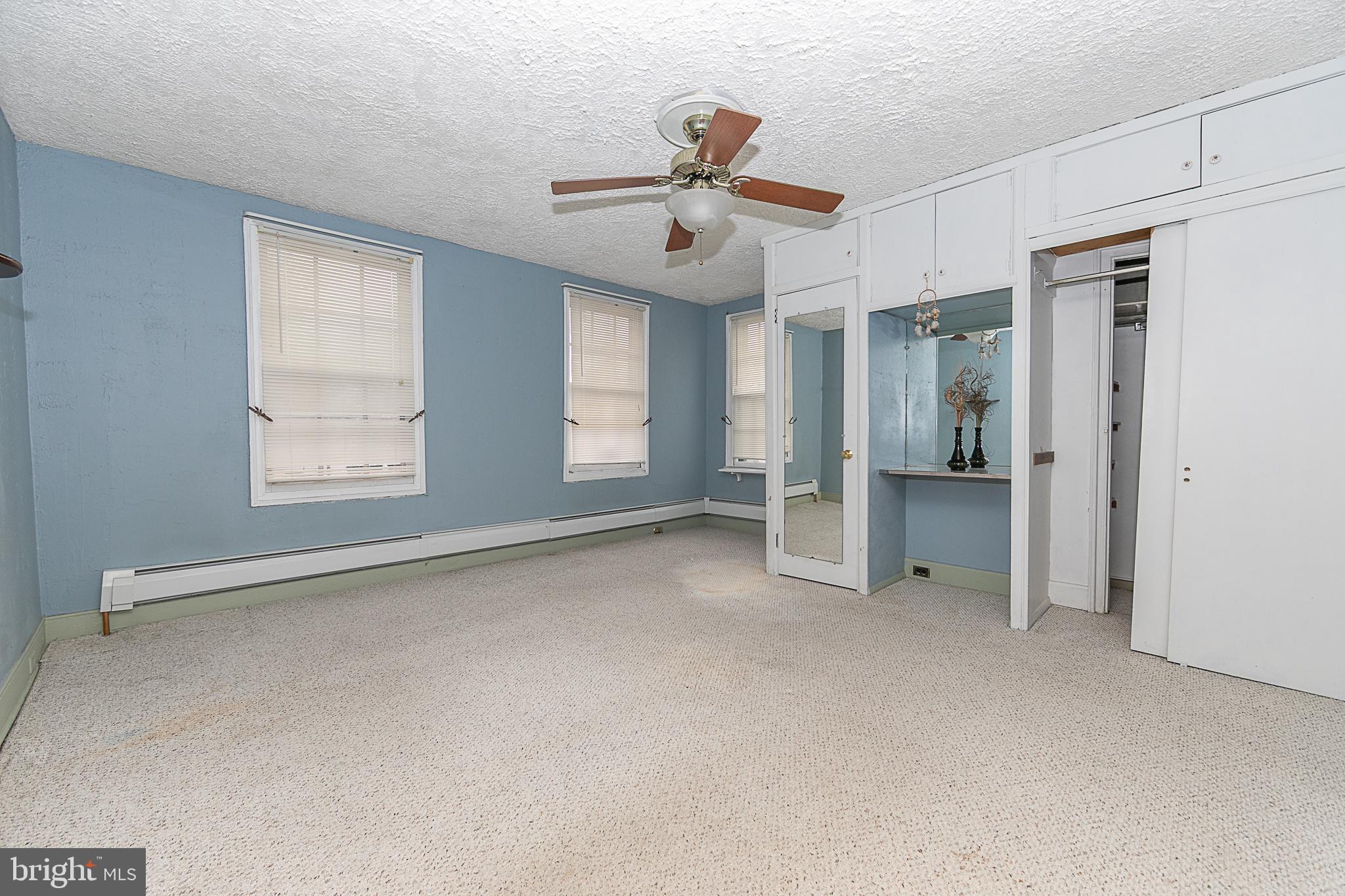 59 Market Street Salem, NJ 08079 - Photo 11 of 21 a view of an empty room with a window