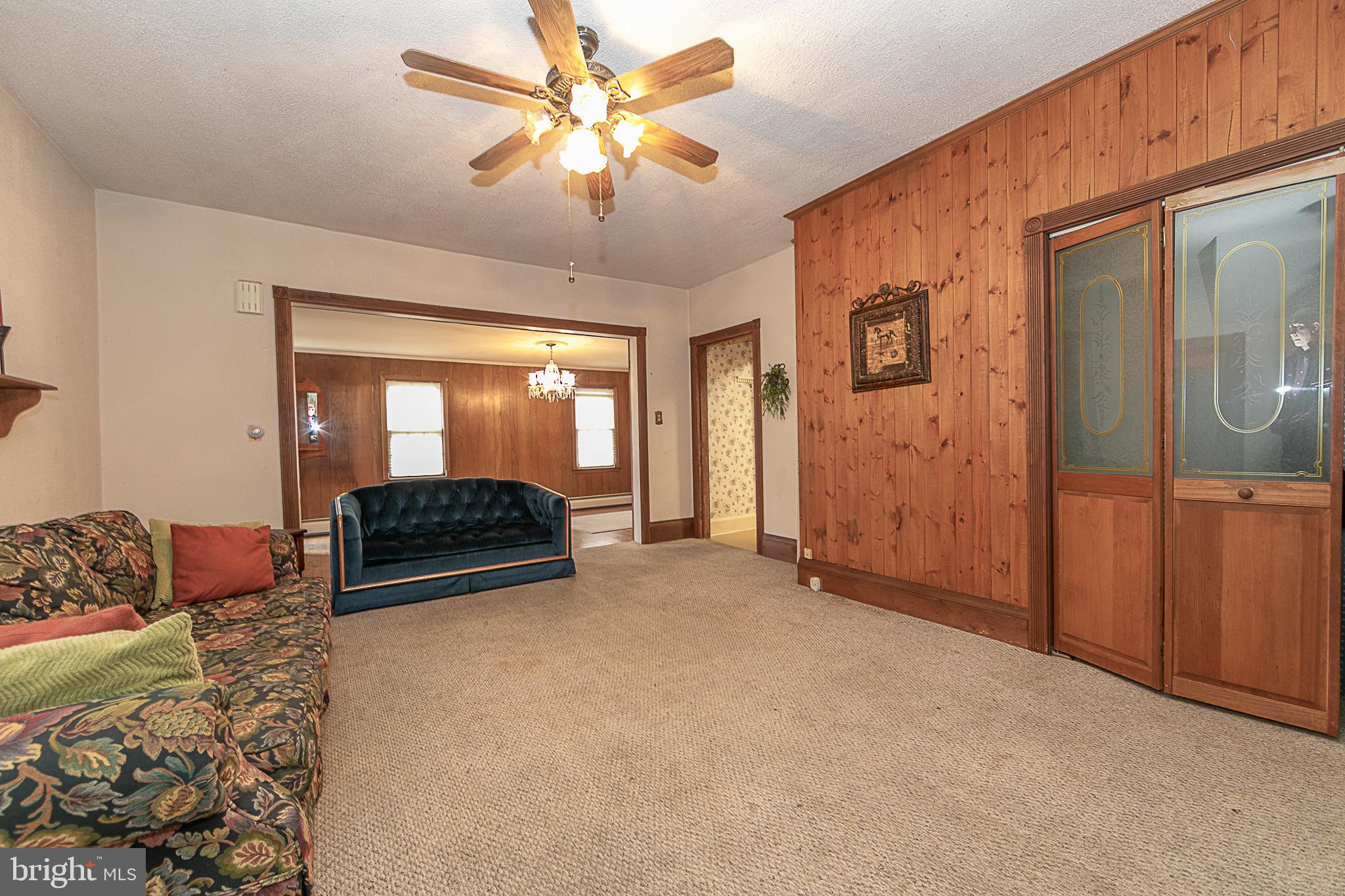 59 Market Street Salem, NJ 08079 - Photo 6 of 21 a view of livingroom with furniture and ceiling fan