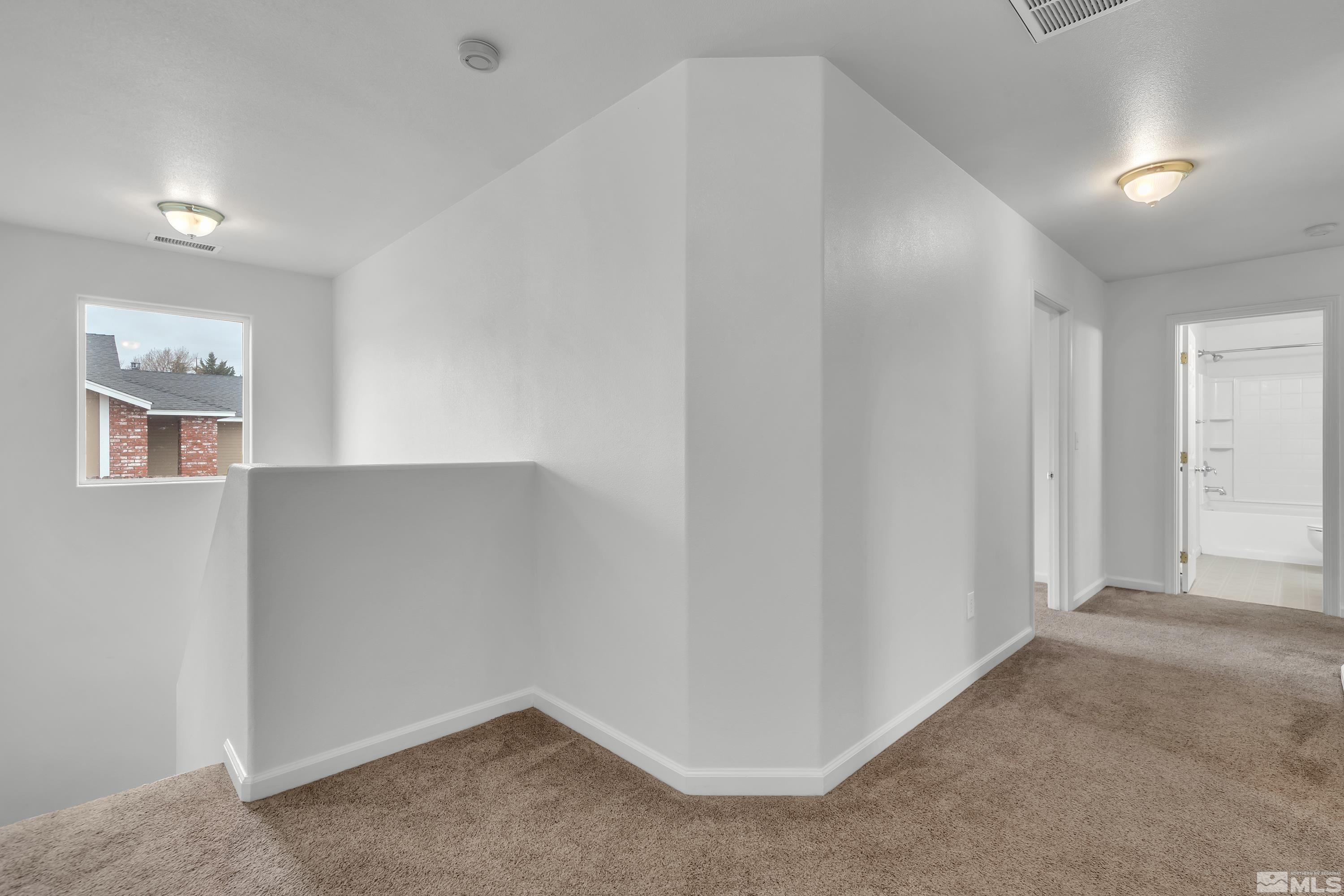 2928 Bryan Street Reno, NV 89503 - Photo 15 of 37 a view of an empty room with windows