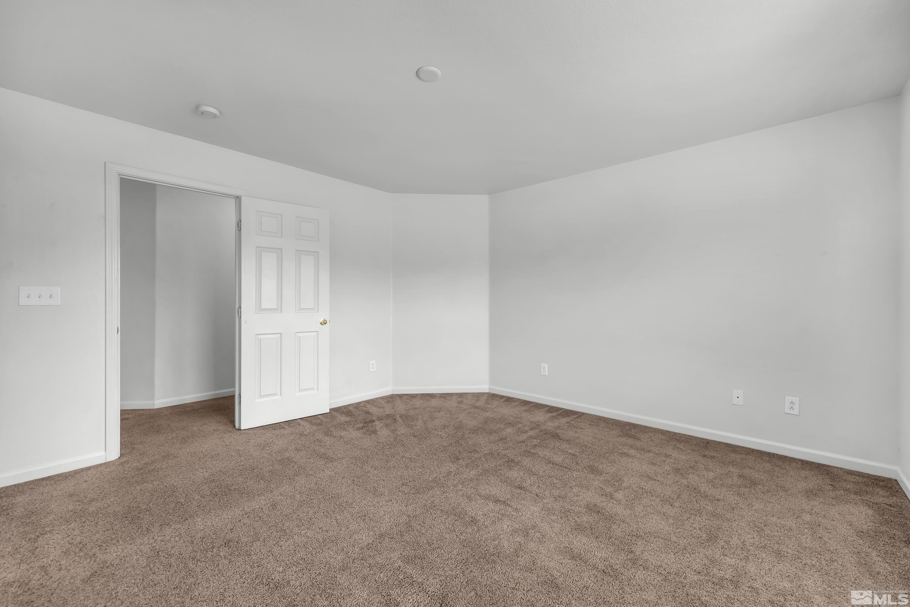 2928 Bryan Street Reno, NV 89503 - Photo 18 of 37 a view of an empty room and chandelier fan