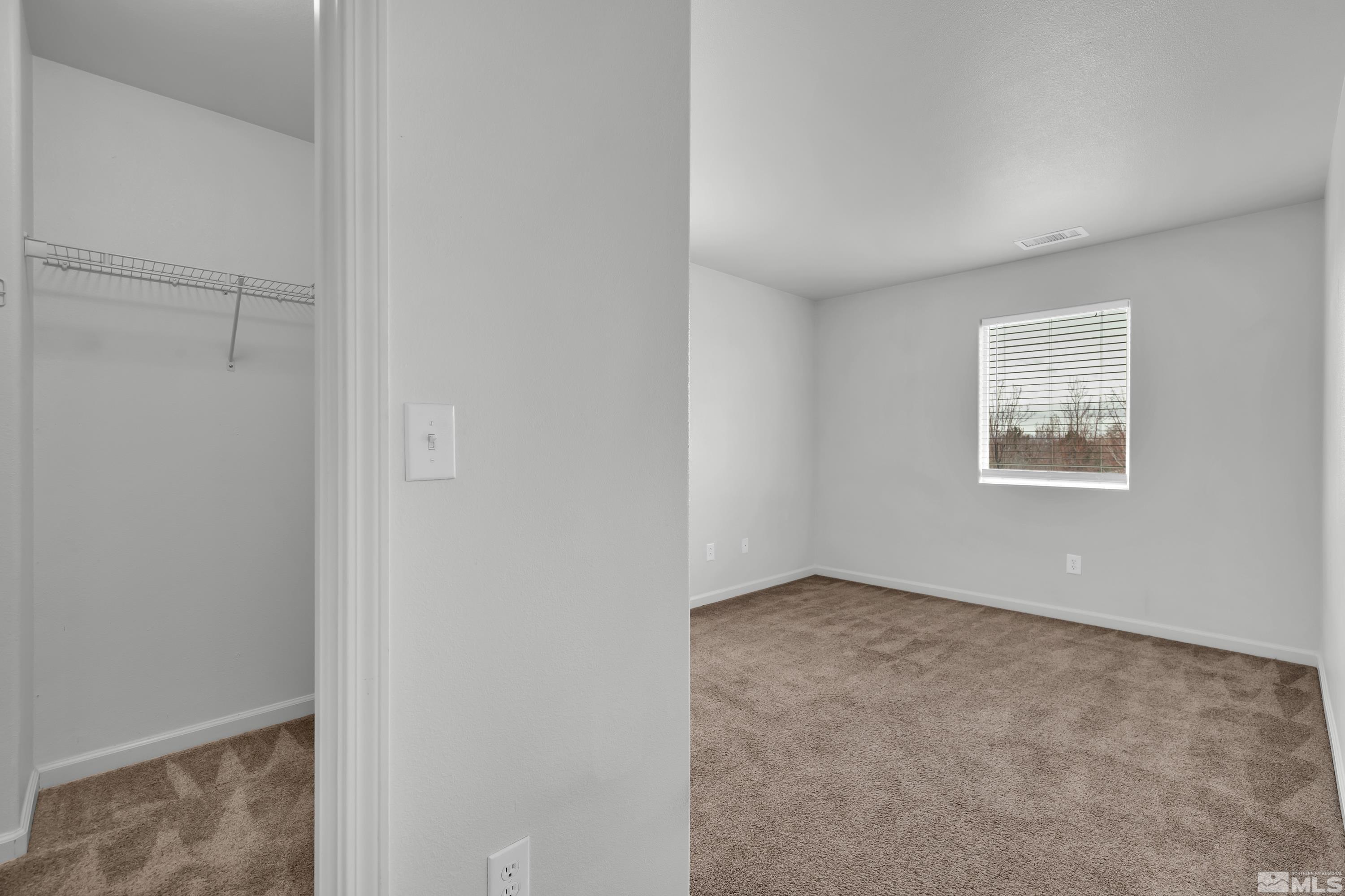 2928 Bryan Street Reno, NV 89503 - Photo 25 of 37 a view of an empty room with a window