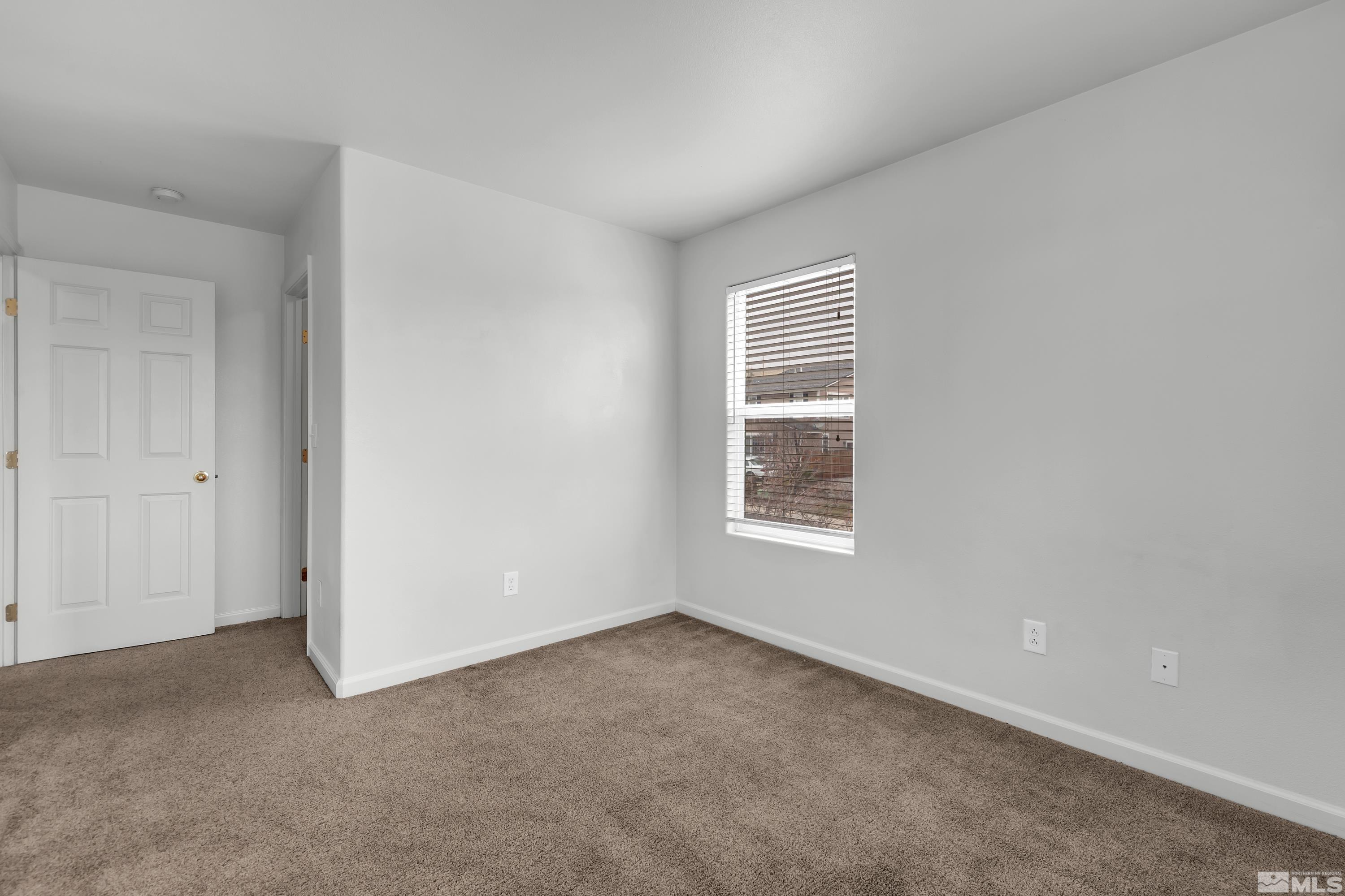 2928 Bryan Street Reno, NV 89503 - Photo 27 of 37 a view of an empty room with a window